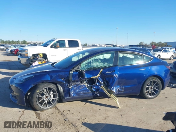 2023 Tesla Model 3 with VIN 5YJ3E1EA6PF505252, listed as a IAAI auction lot 41380172 with 31,141 mi miles and . Bid and sale history available at DreamBid. Image 13.