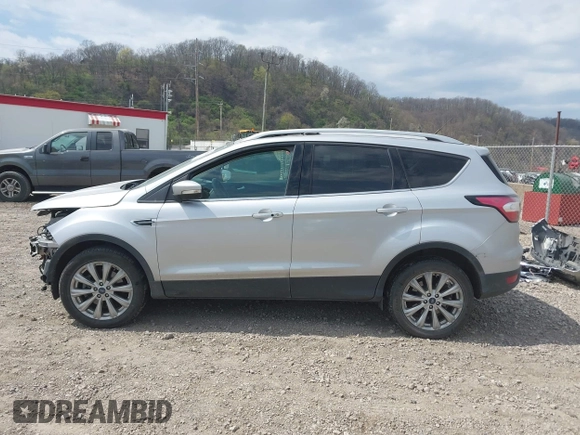 2017 Ford Escape Titanium with VIN 1FMCU9JD0HUE42509, listed as a IAAI auction lot 42079984 with 1 mi miles. Bid and sale history available at carsss.com. Image 15.