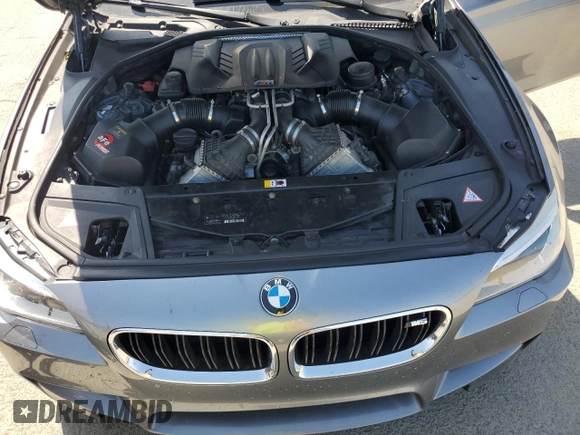 2014 BMW M5 z VIN WBSFV9C58ED593431, wystawiony jako Copart lot #54870555 z przebiegiem 172 191 mil mil oraz Szkoda całkowita • Salvage title. Historia ofert i sprzedaży dostępna na DreamBid. Obrazek 11.