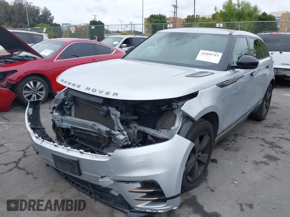 2020 Land Rover Range Rover Velar R-Dynamic S with VIN SALYK2EX7LA242015, listed as a IAAI auction lot 42066743 with 69,632 mi miles and . Bid and sale history available at DreamBid. Image 2.