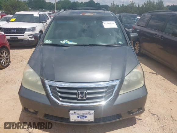2008 Honda Odyssey EX-L with VIN 5FNRL38778B402015, listed as a IAAI auction lot 42252070 with 349,317 mi miles and . Bid and sale history available at DreamBid. Image 6.
