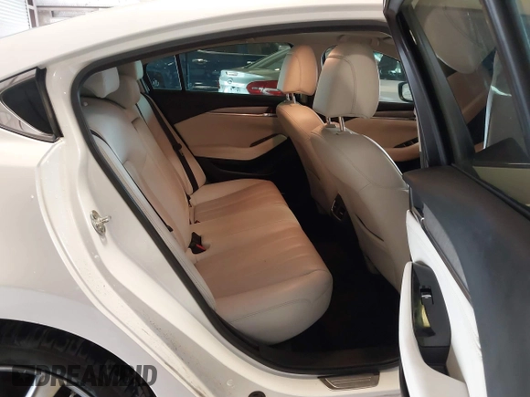 2021 Mazda 6 Carbon Edition with VIN JM1GL1WY9M1614117, listed as a IAAI auction lot 41305576 with 54,670 mi miles and . Bid and sale history available at DreamBid. Image 8.
