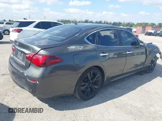 2013 Infiniti M37 with VIN JN1BY1AP8DM511850, listed as a IAAI auction lot 42063120 with 111,545 mi miles. Bid and sale history available at carsss.com. Image 4.