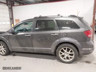 2014 Dodge Journey Limited with VIN 3C4PDDDG9ET204338, listed as a IAAI auction lot 41676032 with 223,129 mi miles. Bid and sale history available at carsss.com. Image 14.