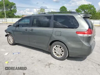 2014 Toyota Sienna XLE with VIN 5TDYK3DC2ES439353, listed as a Copart auction lot 54332275 with 130,312 mi miles and Salvage Title. Bid and sale history available at DreamBid. Image 2.
