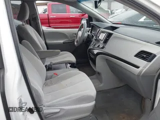 2012 Toyota Sienna LE with VIN 5TDJK3DC3CS048579, listed as a IAAI auction lot 41055074 with 202,791 mi miles. Bid and sale history available at carsss.com. Image 5.