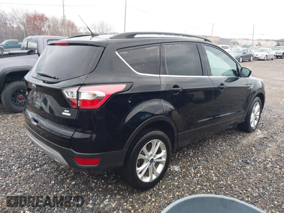 2017 Ford Escape SE with VIN 1FMCU0GD0HUD45409, listed as a IAAI auction lot 41859352 with 52,984 mi miles. Bid and sale history available at carsss.com. Image 4.