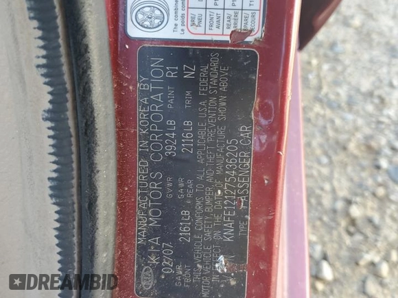 2007 Kia Spectra EX z VIN KNAFE121275436205, wystawiony jako Copart lot #57680055 z przebiegiem 141 670 mil mil oraz Szkoda całkowita • Salvage title. Historia ofert i sprzedaży dostępna na DreamBid. Obrazek 12.