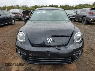 2014 Volkswagen Beetle Turbo R-Line with VIN 3VWVT7AT2EM603435, listed as a Copart auction lot 72755524 with 99,300 mi miles and Salvage Title. Bid and sale history available at DreamBid. Image 5.
