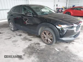 2021 Mazda CX-30 Select with VIN 3MVDMABL7MM272081, listed as a IAAI auction lot 42661392 with 75,108 mi miles and . Bid and sale history available at DreamBid. Image 1.