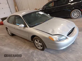 2002 Ford Taurus SE Standard z VIN 1FAFP53U82G231309, wystawiony jako IAAI lot #42329628 z przebiegiem 112 702 mil mil oraz . Historia ofert i sprzedaży dostępna na DreamBid. Obrazek 1.