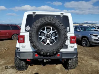 2019 Jeep Wrangler Unlimited Rubicon with VIN 1C4HJXFG0KW515349, listed as a Copart auction lot 45588385 with 64,737 mi miles and Salvage title. Bid and sale history available at DreamBid. Image 6.