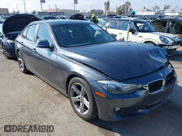 2015 BMW 3 Series 320i with VIN WBA3B1C55FK140317, listed as a IAAI auction lot 41434306 with 120,627 mi miles. Bid and sale history available at carsss.com. Image 1.