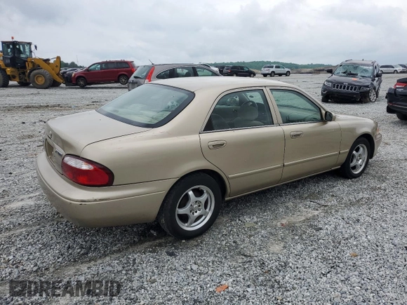 2001 Mazda 626 LX z VIN 1YVGF22C715202574, wystawiony jako Copart lot #54132915 z przebiegiem 237 041 mil mil oraz Szkoda całkowita • Salvage title. Historia ofert i sprzedaży dostępna na DreamBid. Obrazek 3.