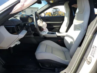 2024 Porsche Taycan z VIN WP0AA2Y17RSA10152, wystawiony jako Copart lot #83117234 z przebiegiem Nie podano mil oraz Szkody całkowita. Historia ofert i sprzedaży dostępna na DreamBid. Obrazek 7.