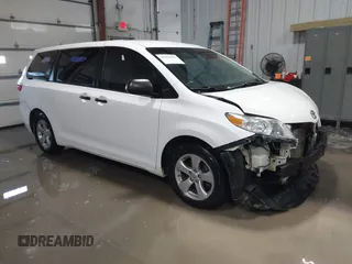 2015 Toyota Sienna L with VIN 5TDZK3DC3FS617518, listed as a IAAI auction lot 41566048 with 188,494 mi miles. Bid and sale history available at carsss.com. Image 1.