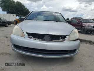 2006 Mitsubishi Lancer with VIN JA3AJ16E56U005818, listed as a Copart auction lot 60749615 with 155,194 mi miles and Salvage title. Bid and sale history available at DreamBid. Image 5.