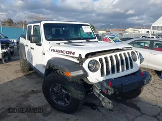 2023 Jeep Gladiator Rubicon z VIN 1C6JJTBG5PL566958, wystawiony jako IAAI lot #42298811 z przebiegiem 18 568 mil mil oraz . Historia ofert i sprzedaży dostępna na DreamBid. Obrazek 1.
