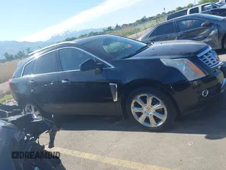 2015 Cadillac SRX Premium Collection with VIN 3GYFNGE3XFS554620, listed as a IAAI auction lot 42308670 with 95,063 mi miles and . Bid and sale history available at DreamBid. Image 13.