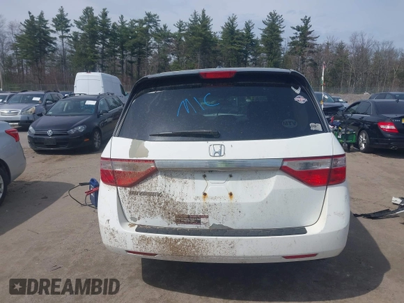2012 Honda Odyssey EX-L with VIN 5FNRL5H65CB082916, listed as a IAAI auction lot 42052713 with 217,267 mi miles and . Bid and sale history available at carsss.com. Image 17.