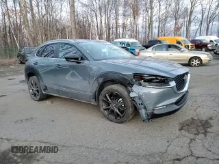 2023 Mazda CX-30 S Carbon Edition с VIN 3MVDMBCM3PM500403, выставлен на аукционе Copart как лот 88146095 с пробегом 29 861 миль миль и Списание • Salvage title. История ставок и продаж доступна на DreamBid. Изображение 11.