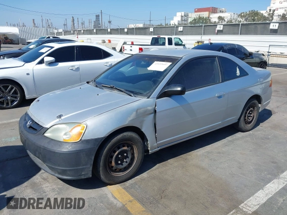 2003 Honda Civic LX with VIN 1HGEM22563L085882, listed as a IAAI auction lot 42227001 with 202,724 mi miles and . Bid and sale history available at DreamBid. Image 2.