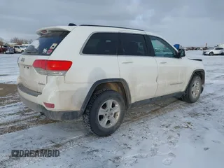 2015 Jeep Grand Cherokee Laredo with VIN 1C4RJFAG9FC234146, listed as a IAAI auction lot 41507621 with 171,112 mi miles. Bid and sale history available at carsss.com. Image 4.