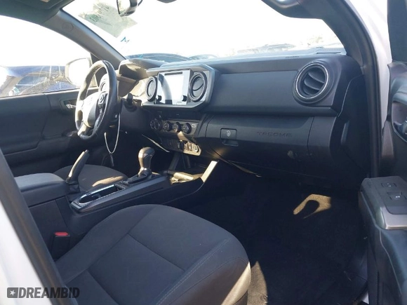 2019 Toyota Tacoma 4WD SR5 with VIN 3TMDZ5BN2KM074159, listed as a IAAI auction lot 41295303 with 41,293 mi miles. Bid and sale history available at carsss.com. Image 5.