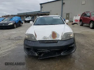 2003 Hyundai Tiburon z VIN KMHHM65D53U042971, wystawiony jako Copart lot #86919434 z przebiegiem 202 250 mil mil oraz Szkoda całkowita • Salvage title. Historia ofert i sprzedaży dostępna na DreamBid. Obrazek 5.