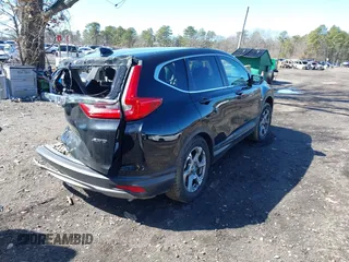 2019 Honda CR-V EX with VIN 2HKRW2H5XKH674504, listed as a IAAI auction lot 41823838 with 104,281 mi miles. Bid and sale history available at carsss.com. Image 3.