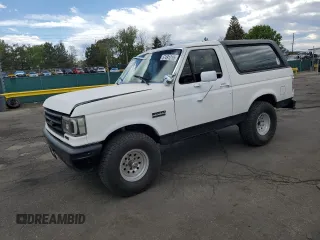 1990 Ford Bronco Custom z VIN 1FMEU15HXLLB06033, wystawiony jako Copart lot #57491215 z przebiegiem 20 012 mil mil oraz Nie do naprawy • Non repairable. Historia ofert i sprzedaży dostępna na DreamBid. Obrazek 1.