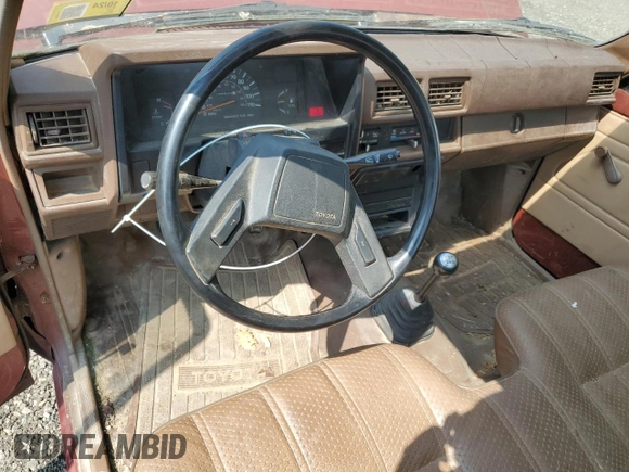 1986 Toyota Pickup с VIN JT4RN55R2G0227195, выставлен на аукционе Copart как лот 60195645 с пробегом 88 825 миль миль и Чистый • Clean title. История ставок и продаж доступна на DreamBid. Изображение 8.