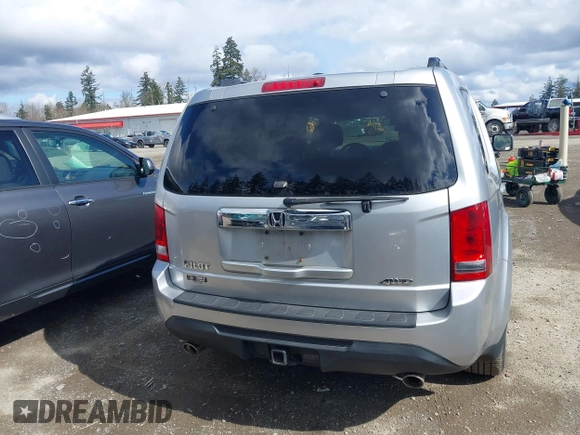2013 Honda Pilot EX-L with VIN 5FNYF4H71DB041562, listed as a IAAI auction lot 41819184 with 136,014 mi miles and . Bid and sale history available at DreamBid. Image 16.