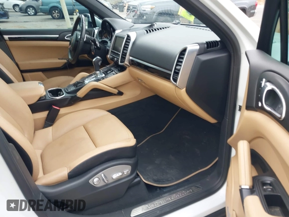 2014 Porsche Cayenne with VIN WP1AA2A27ELA09019, listed as a IAAI auction lot 42068012 with 77,997 mi miles and . Bid and sale history available at DreamBid. Image 5.