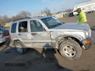 2004 Jeep Liberty Sport with VIN 1J4GK48K34W101682, listed as a IAAI auction lot 41724084 with 58,784 mi miles and . Bid and sale history available at DreamBid. Image 13.