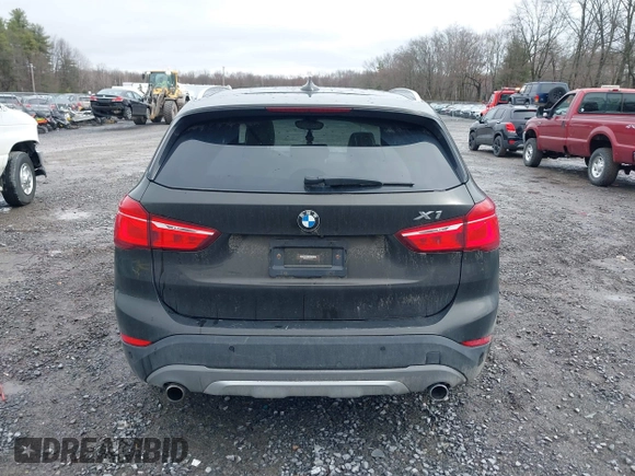 2018 BMW X1 xDrive28i with VIN WBXHT3C34J5K31430, listed as a IAAI auction lot 41954792 with 125,447 mi miles. Bid and sale history available at carsss.com. Image 16.