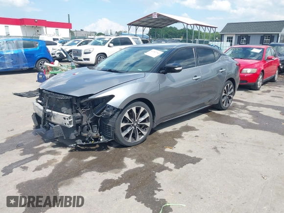 2016 Nissan Maxima SL with VIN 1N4AA6AP7GC395308, listed as a IAAI auction lot 42187762 with 154,171 mi miles and . Bid and sale history available at DreamBid. Image 19.