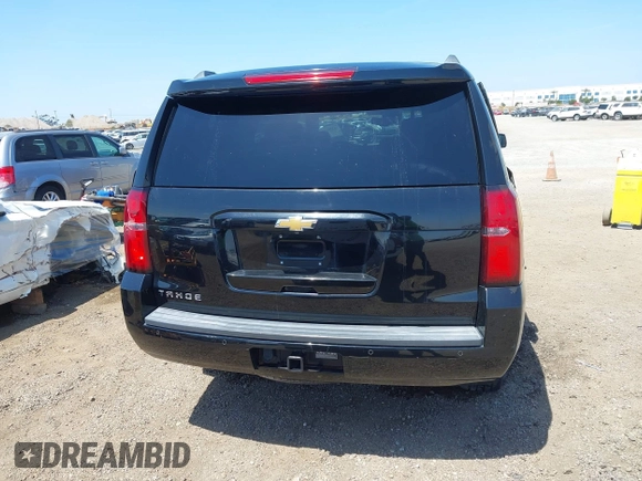 2015 Chevrolet Tahoe LT with VIN 1GNSCBKC8FR612607, listed as a IAAI auction lot 42099907 with 138,037 mi miles and . Bid and sale history available at DreamBid. Image 16.