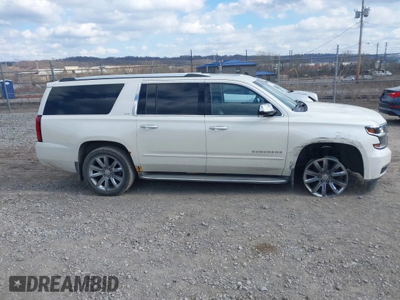 2015 Chevrolet Suburban LTZ with VIN 1GNSKKKC4FR304532, listed as a IAAI auction lot 41899860 with 123,624 mi miles. Bid and sale history available at carsss.com. Image 13.