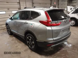 2017 Honda CR-V Touring with VIN 5J6RW2H95HL042012, listed as a IAAI auction lot 41911028 with 93,575 mi miles. Bid and sale history available at carsss.com. Image 3.
