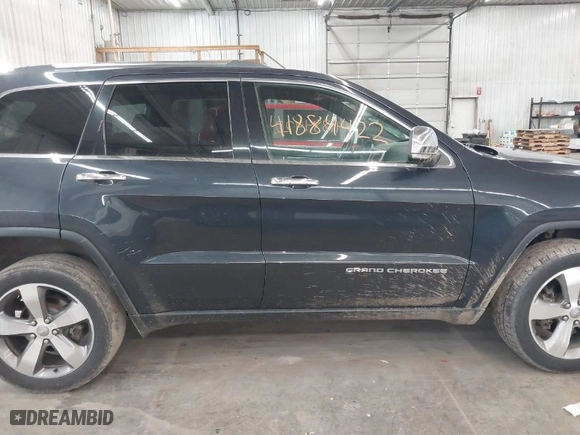 2015 Jeep Grand Cherokee Limited with VIN 1C4RJFBG8FC665320, listed as a IAAI auction lot 41884422 with 125,610 mi miles. Bid and sale history available at carsss.com. Image 13.