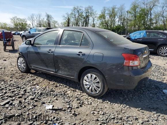 2010 Toyota Yaris with VIN JTDBT4K35A1355708, listed as a Copart auction lot 54347695 with 103,689 mi miles and Salvage Title. Bid and sale history available at carsss.com. Image 2.