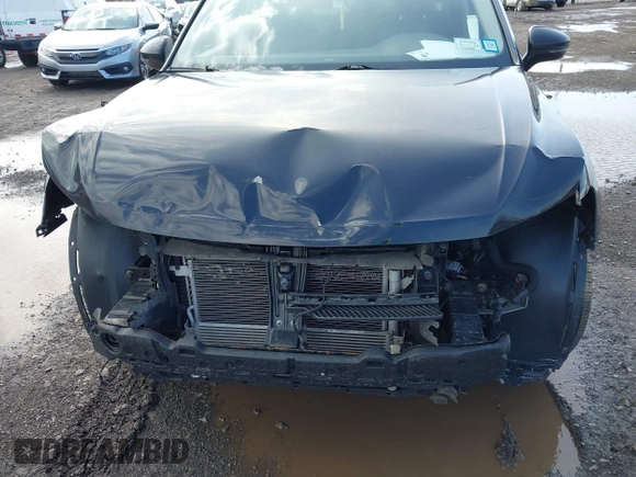 2020 Volkswagen Tiguan SE with VIN 3VV2B7AX5LM091857, listed as a IAAI auction lot 41922727 with 83,464 mi miles and . Bid and sale history available at DreamBid. Image 12.