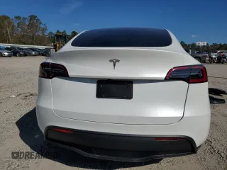 2025 Tesla Model Y Long Range with VIN 7SAYGDED3SA339079, listed as a Copart auction lot 82041424 with 1,793 mi miles and Salvage Title. Bid and sale history available at DreamBid. Image 6.
