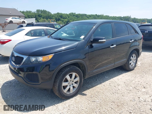 2013 Kia Sorento LX with VIN 5XYKT3A19DG381288, listed as a IAAI auction lot 42797647 with 220,000 mi miles and . Bid and sale history available at DreamBid. Image 2.