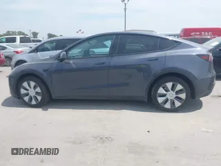 2023 Tesla Model Y Long Range z VIN 7SAYGDEE6PA169168, wystawiony jako IAAI lot #42050428 z przebiegiem 26 731 mil mil oraz . Historia ofert i sprzedaży dostępna na DreamBid. Obrazek 14.