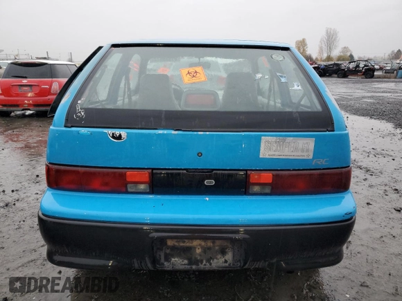 1992 Geo Metro z VIN 2C1MR2467N6724779, wystawiony jako Copart lot #81355814 z przebiegiem 85 587 mil mil oraz Szkody całkowita. Historia ofert i sprzedaży dostępna na DreamBid. Obrazek 6.