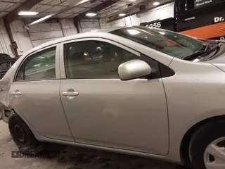2009 Toyota Corolla with VIN 1NXBU40E69Z129314, listed as a IAAI auction lot 41718098 with 170,739 mi miles. Bid and sale history available at carsss.com. Image 14.