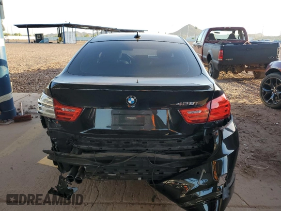 2016 BMW 4 Series 428i z VIN WBA4A9C50GG505822, wystawiony jako Copart lot #63792375 z przebiegiem 105 759 mil mil oraz Szkoda całkowita • Salvage title. Historia ofert i sprzedaży dostępna na DreamBid. Obrazek 6.