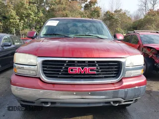 2003 GMC Yukon SLT with VIN 1GKEK13Z73R199374, listed as a IAAI auction lot 41840225 with 230,235 mi miles. Bid and sale history available at carsss.com. Image 12.